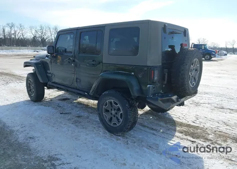 2010 Jeep Wrangler Unlimited Sahara z USA, uszkodzony, nr VIN 1J4BA5H11AL215557